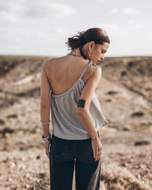 The Striped Asymmetrical Top