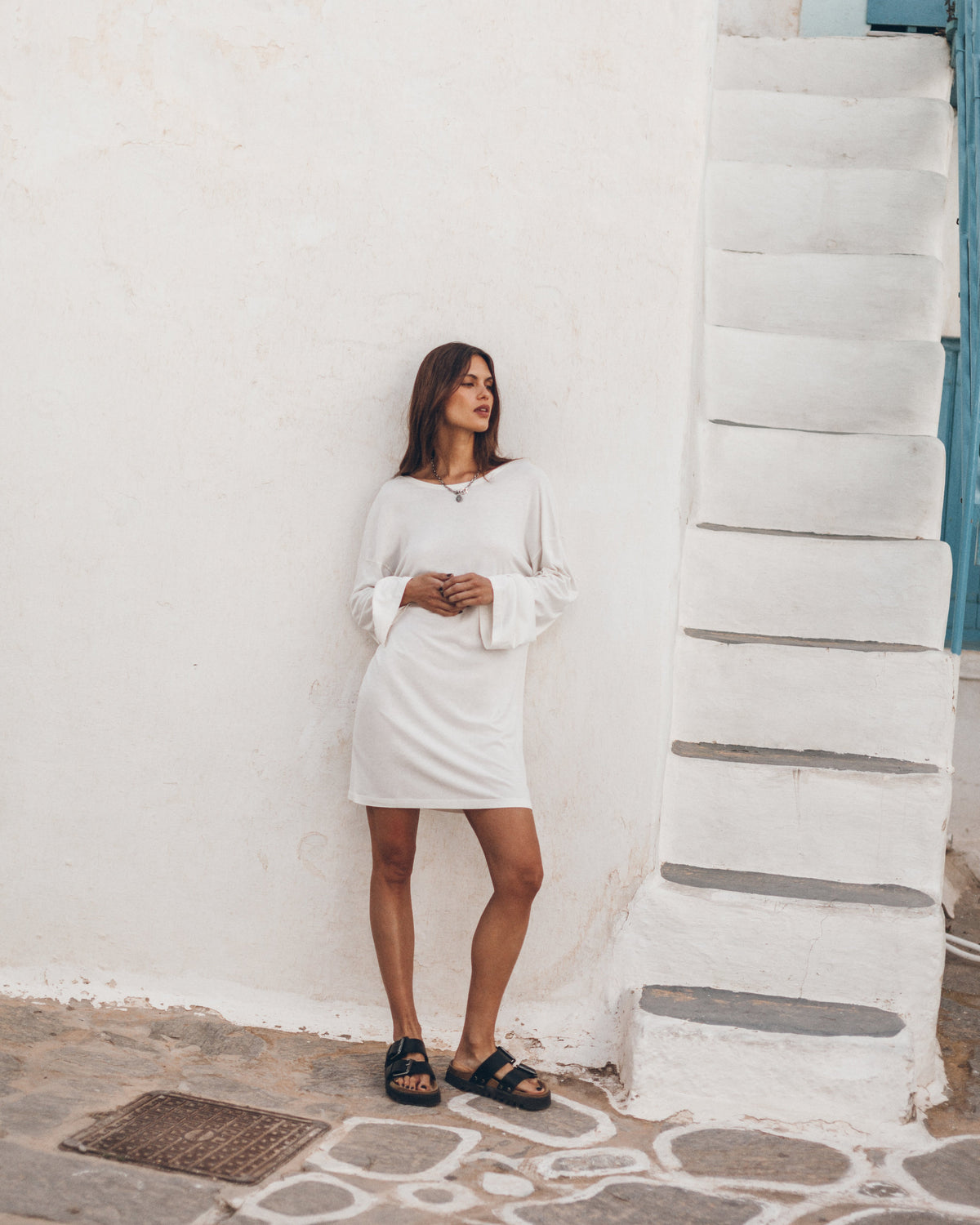 The White Low Back Short Longsleeve Dress