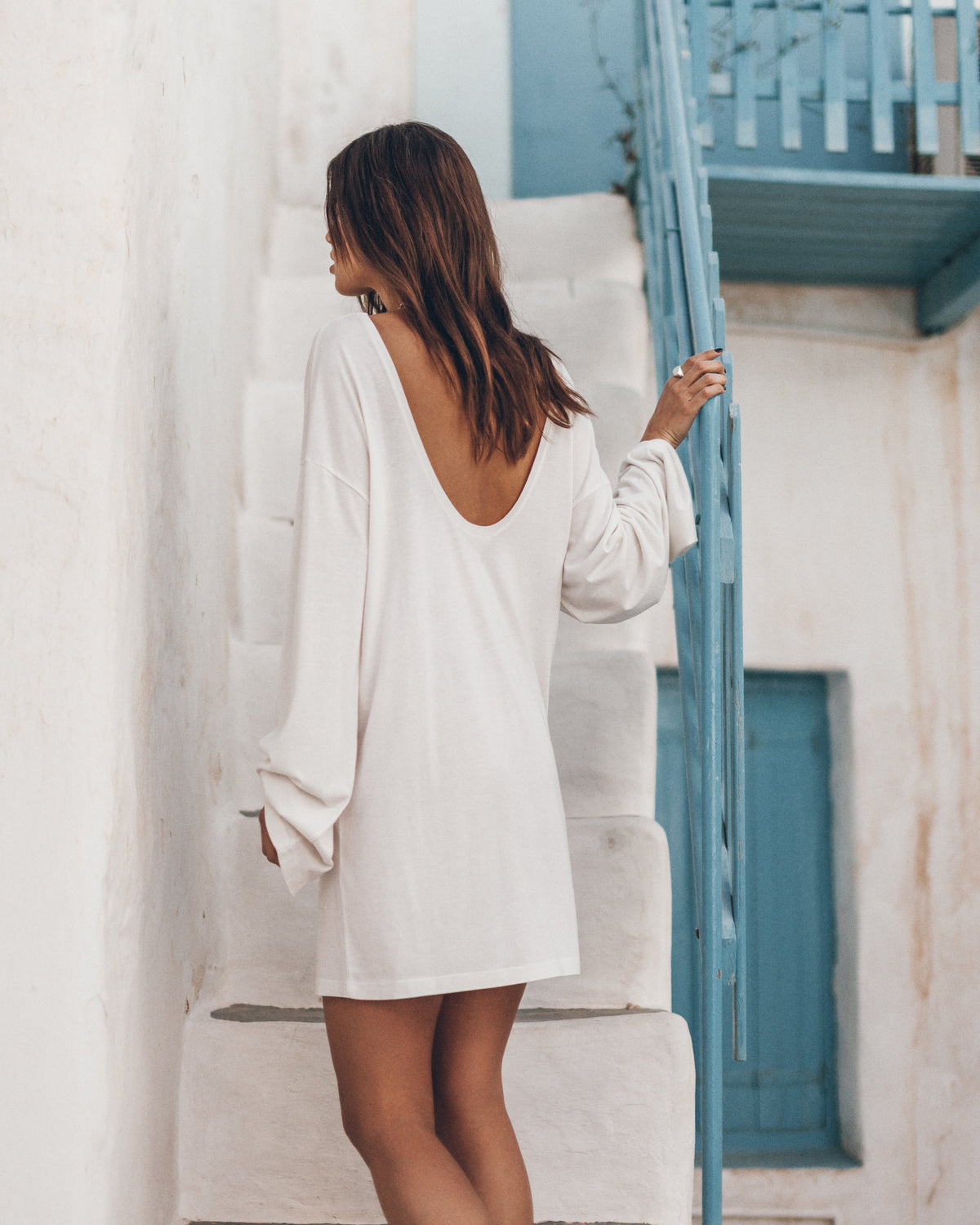The White Low Back Short Longsleeve Dress